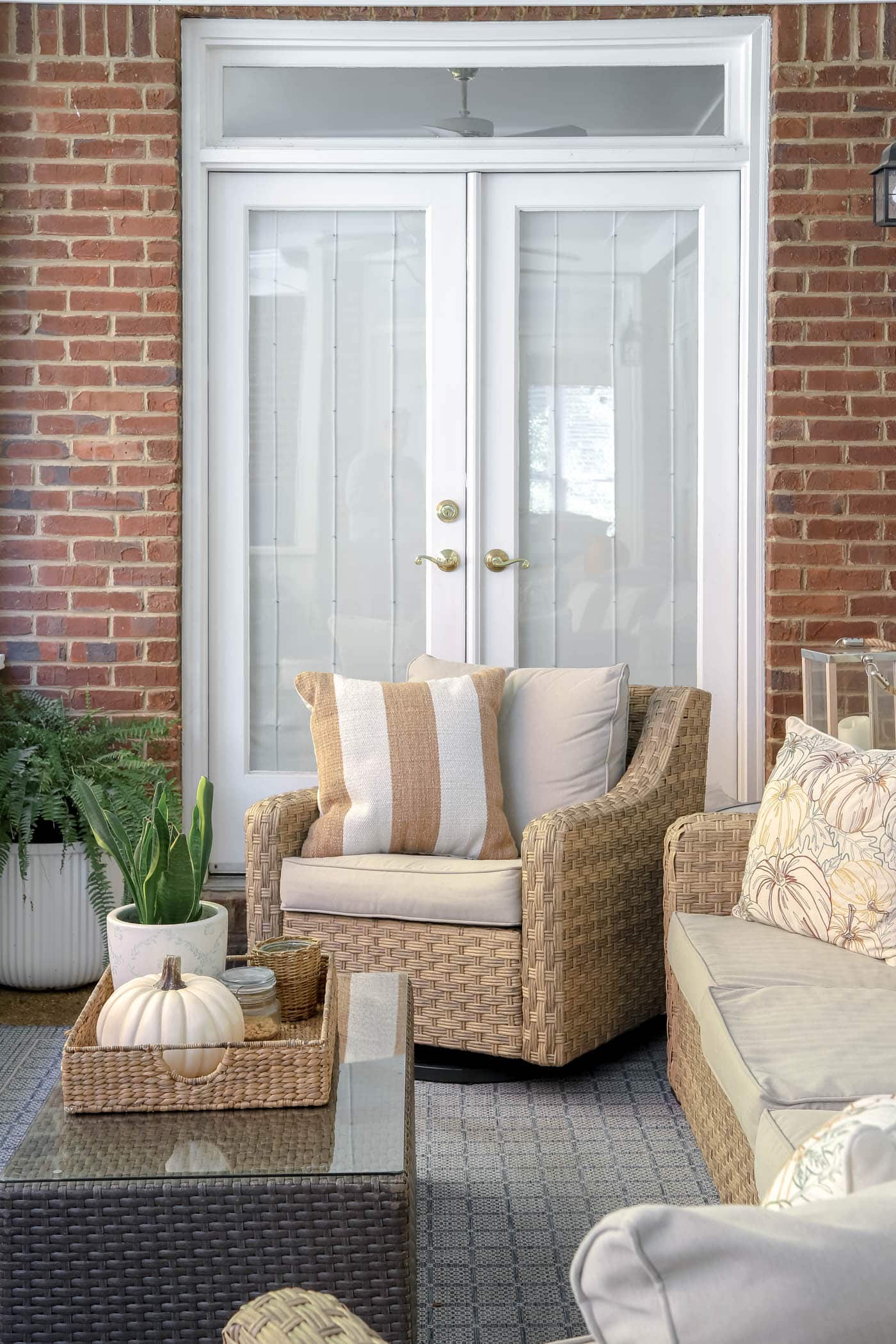 back porch with fall pillows