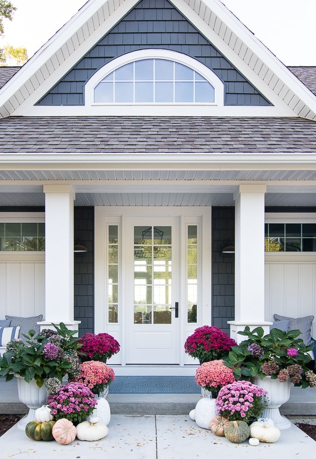 modern lake home with jewel tone pumpkins and neutral pumpkins.