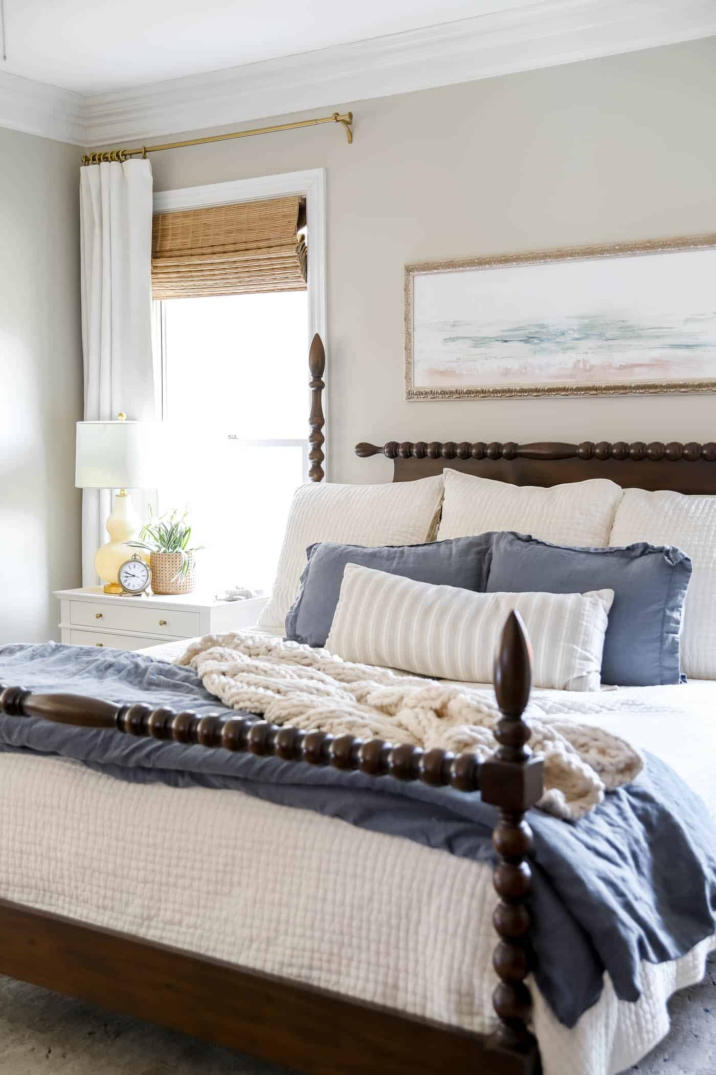 Primary traditional bedroom with 4-poster bed.