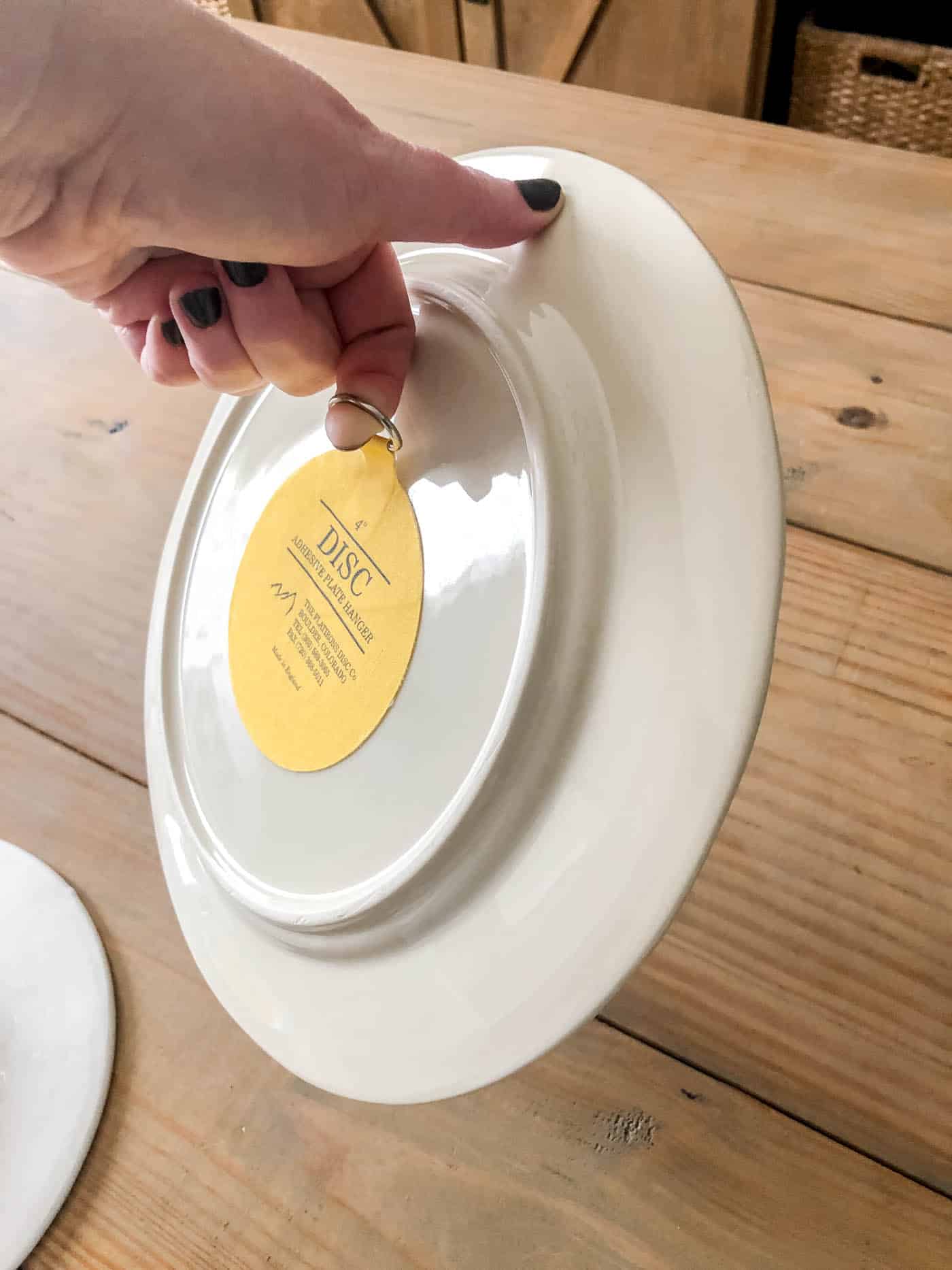 leave the plate hanger for 24 hours and then test before hanging on the wall.