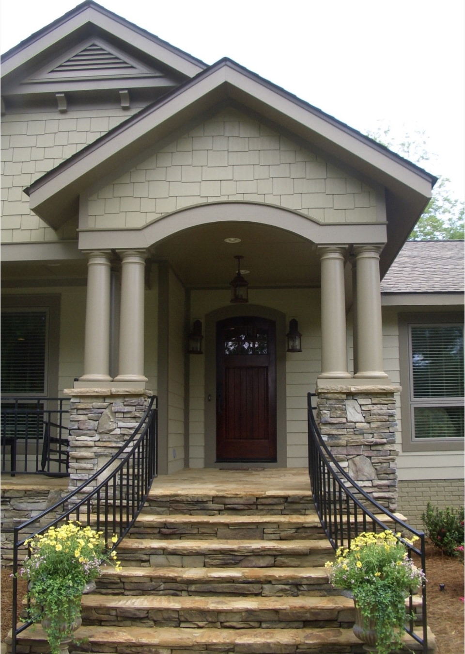 Exterior of a home with Universal Khaki Sherwin Williams