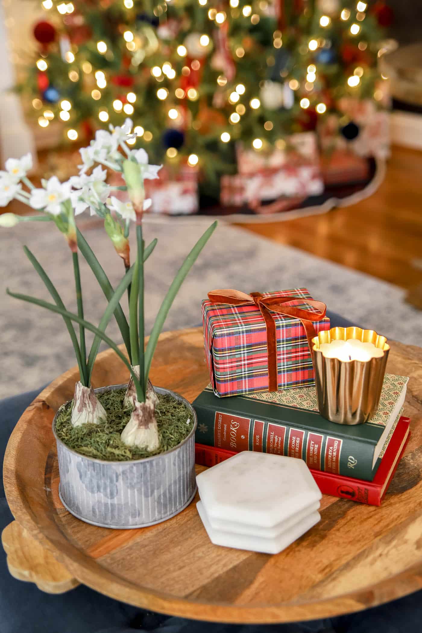 Ralph Lauren Christmas Decor with a wood tray on an ottoman.