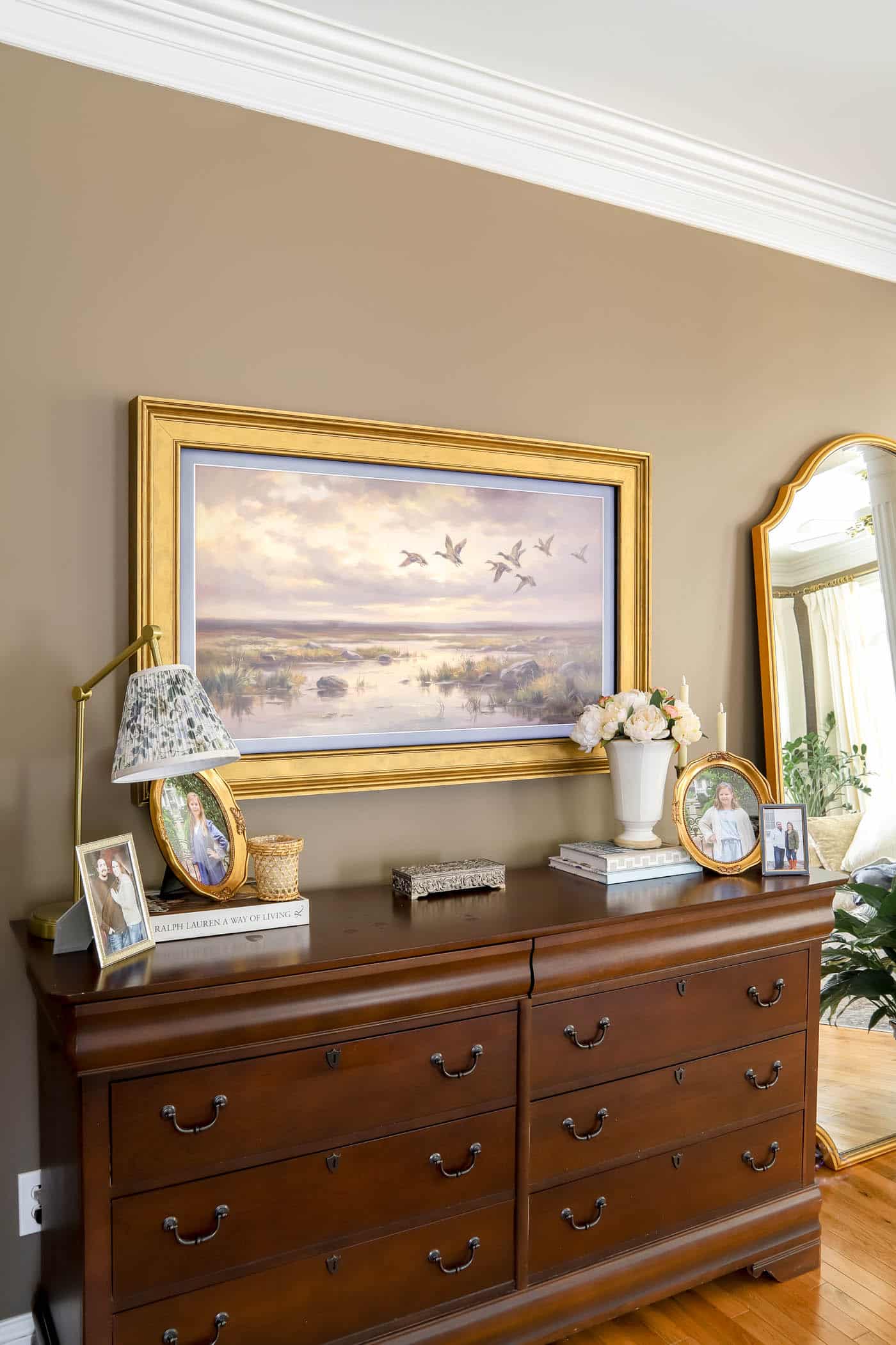 Frame TV on the bedroom wall