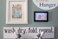 DIY Wall-Mounted Ironing Board Hanger for Small Spaces