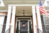 Brick Home Exterior Makeover: White Trim and Black Shutters