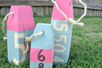 DIY Weathered Wood Beach Buoys for Rustic Coastal Decor