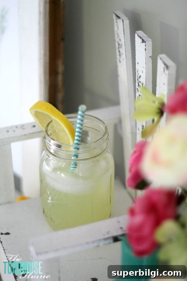 Garden and Lemonade Stand Summer Mantel Ideas 8 I love these fresh pops of colors and citrus inspiration on this fun summer mantel! A Garden and Lemonade Stand Summer Mantel. Get all the juicy details at TheTurquoiseHome.com