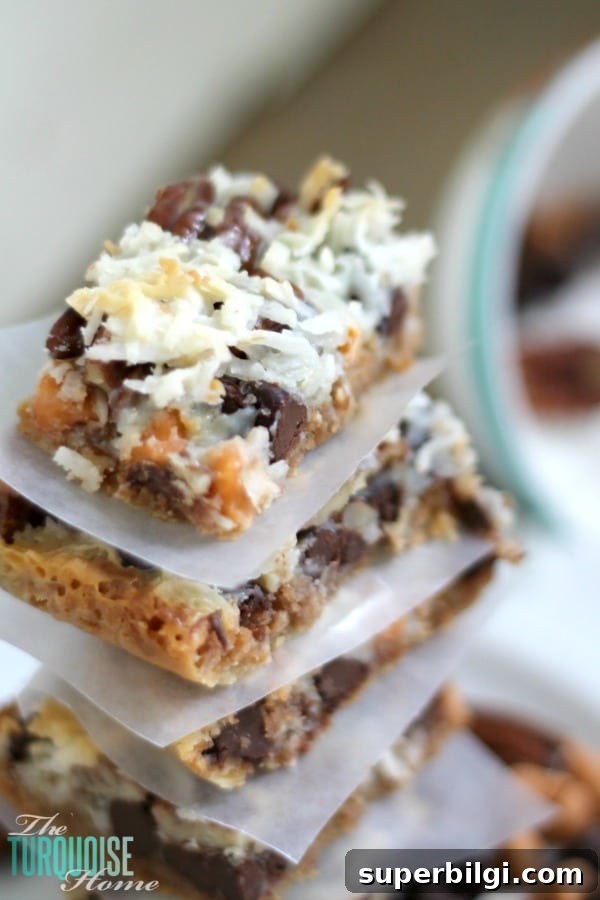 Classic Hello Dolly Magic Bars Recipe 3 This quick and easy dessert is the traditional and yummy Hello Dolly Bar, but can also be called a Magic Bar or a 7 Layer Bar. Whatever you call it, the soft, delicious graham cracker crust, rich chocolate and crunchy coconut drizzled with sweetened condensed milk is so scrumptious that you'll be making them for every pool party this summer. | Recipe via TheTurquoiseHome.com