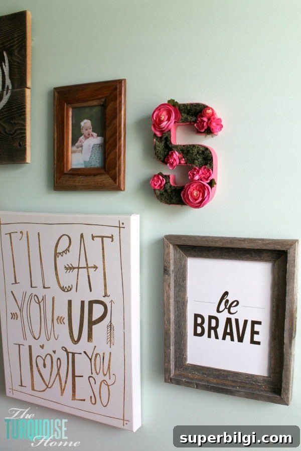 Woodland Nursery Gallery Wall Ideas for Baby Girls 9 Such a sweet, girly gallery wall in a woodland nursery. All of the details at TheTurquoiseHome.com