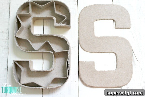 DIY Floral and Moss Letter Art for Wall Decor 3 Paper mache letter cut open and ready to fill with moss and flowers