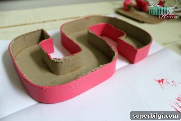 DIY Floral and Moss Letter Art for Wall Decor 4 Painted paper mache initial ready to be filled