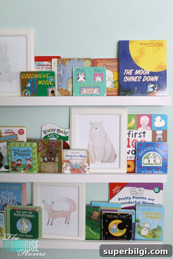 DIY Floating Bookshelf Ledges for Nursery Decor 12 Nursery wall with ledges, books, and framed watercolor prints.