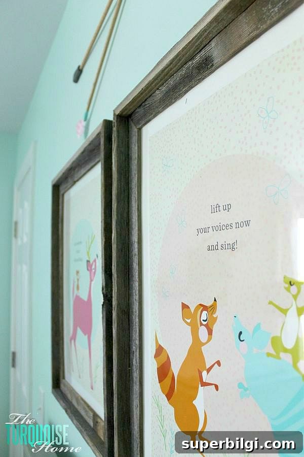 Baby Girl Woodland Nursery Reveal: Complete Tour 13 All of the pretty pink and turquoise touches with a woodland theme make a sweet retreat for any little girl. | Baby Girl's Woodland Nursery | All the details at TheTurquoiseHome.com