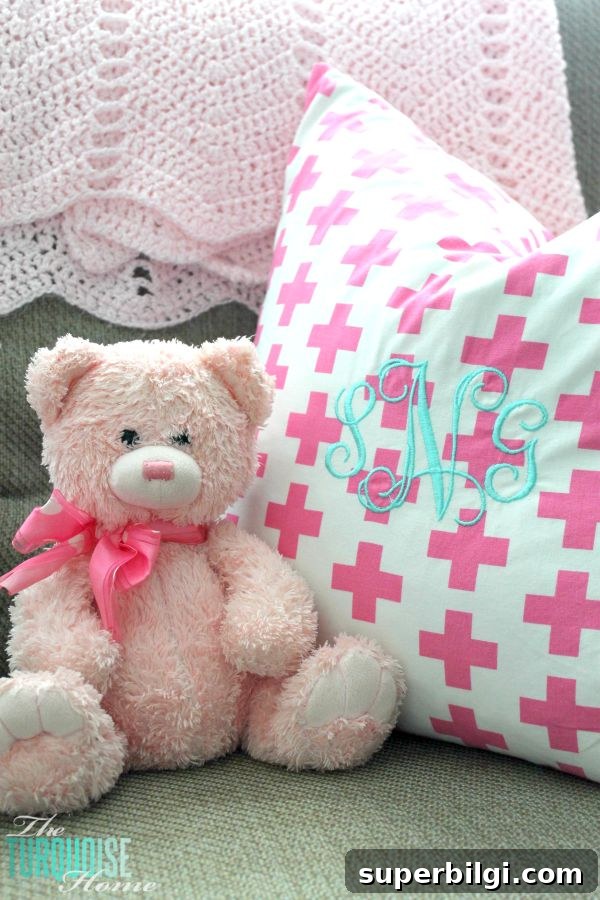 Baby Girl Woodland Nursery Reveal: Complete Tour 18 All of the pretty pink and turquoise touches with a woodland theme make a sweet retreat for any little girl. | Baby Girl's Woodland Nursery | All the details at TheTurquoiseHome.com