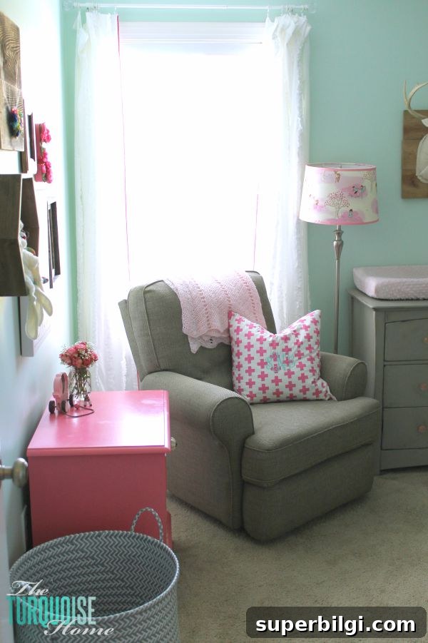Baby Girl Woodland Nursery Reveal: Complete Tour 4 All of the pretty pink and turquoise touches with a woodland theme make a sweet retreat for any little girl. | Baby Girl's Woodland Nursery | All the details at TheTurquoiseHome.com