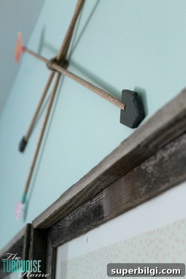 DIY Decorative Arrows: Rustic Wall & Mantel Decor Ideas 3 These DIY decorative arrows are so inexpensive and cute! The perfect finishing touch to a girl's woodland nursery. | Details at TheTurquoiseHome.com