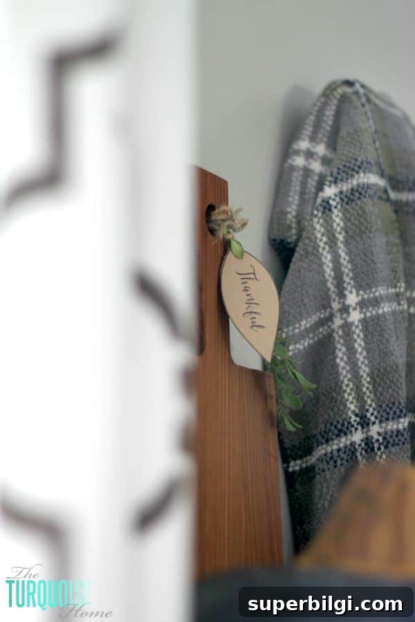 Grateful Fall Mantel Decor Ideas 6 Plaids, neutrals and a few pops of autumnal color bring this message of gratitude home. I love the sweet reminder to be grateful this season - and always! | Grateful Fall Mantel | Details at TheTurquoiseHome.com
