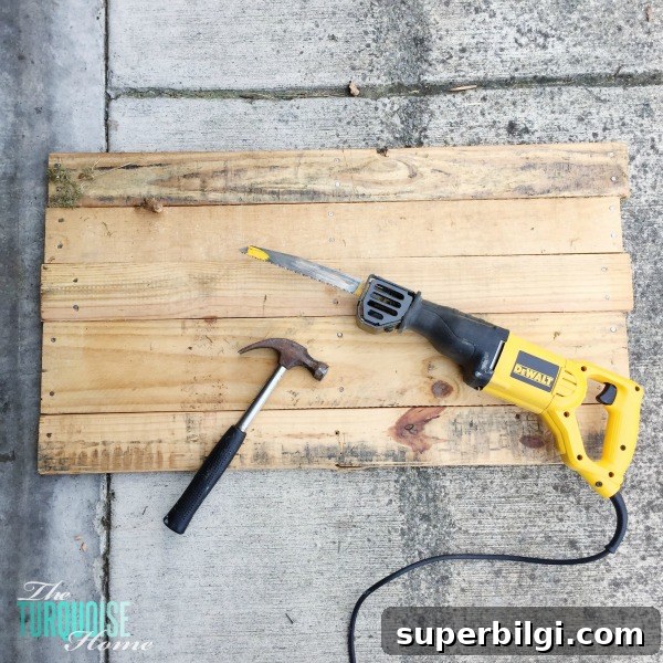 Personalize your home decor with a DIY lettered pallet sign! Full tutorial at TheTurquoiseHome.com