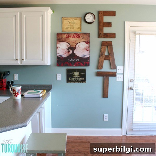 Transform Kitchen Cabinets with Benjamin Moore Simply White 5 DIY Painted Kitchen Cabinets with Benjamin Moore Simply White and EAT sign from pallets | Details at TheTurquoiseHome.com