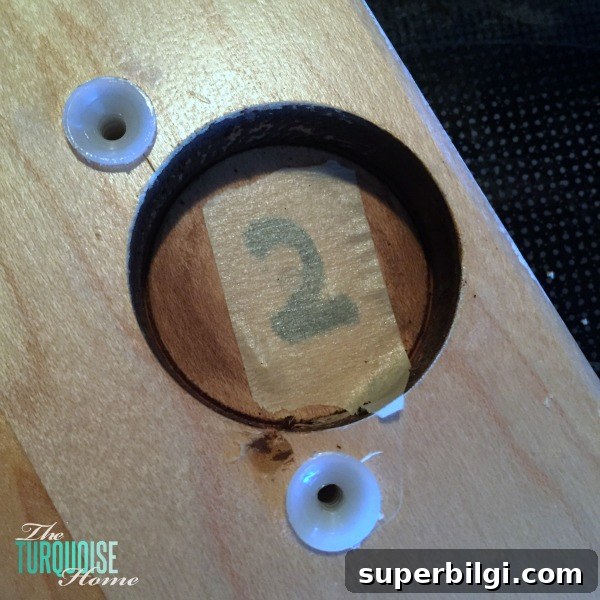 DIY Paint Kitchen Cabinets Without Professional Tools 6 When painting your cabinets, you'll want to number each of them in a way that won't get paint over it. That way when you go to put the doors back on, you'll know where they go. | Painting Kitchen Cabinets tutorial at TheTurquoiseHome.com