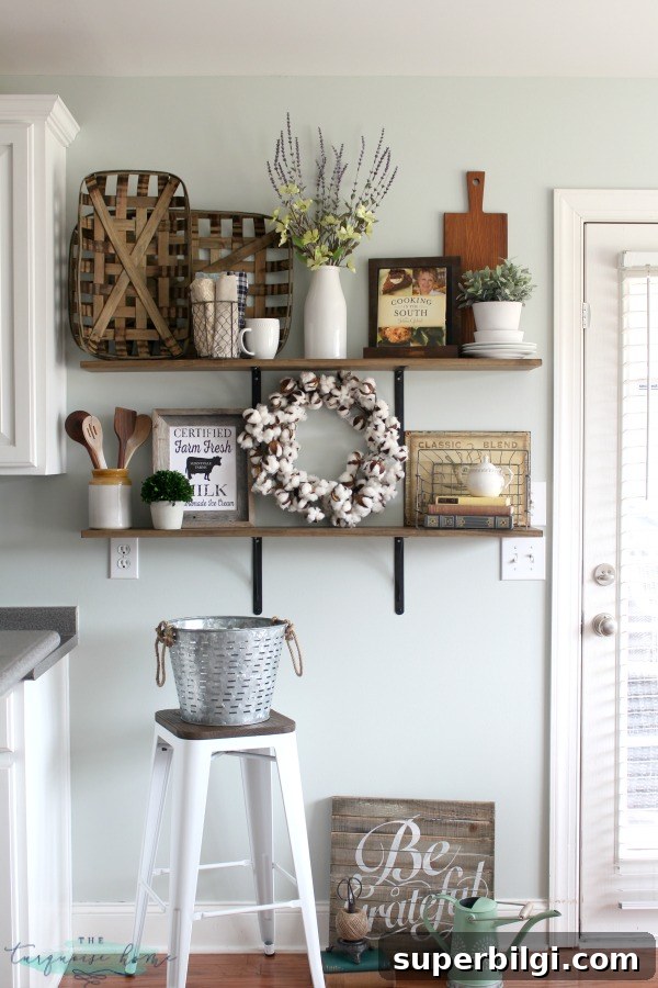 How to Style Farmhouse Kitchen Open Shelves 2 LOVE these tips for styling shelves. These $40 DIY shelves were transformed with some old and new farmhouse decor. | TheTurquoiseHome.com