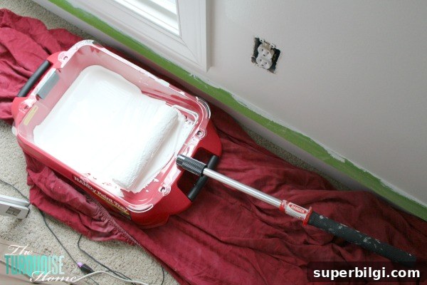 How to Paint a Room Like a Pro in 5 Steps 8 Easy Steps for Painting a Room: Rolling the Wall | TheTurquoiseHome.com