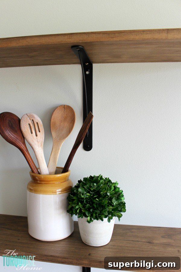 How to Build Farmhouse Shelves for Under $40 2 DIY farmhouse shelves installed on kitchen wall