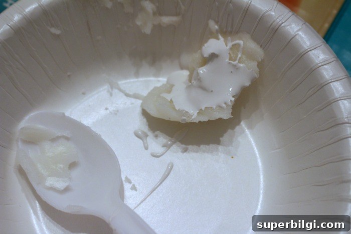 How to Create a Driftwood Finish for Furniture 4 Mixing white paint into finishing wax for driftwood effect