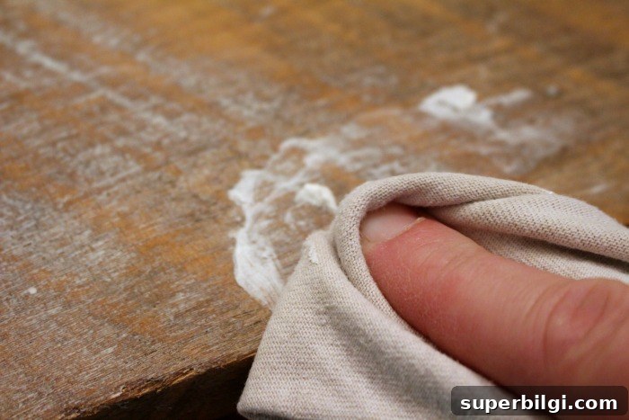 How to Create a Driftwood Finish for Furniture 5 Applying white wax to create a driftwood finish