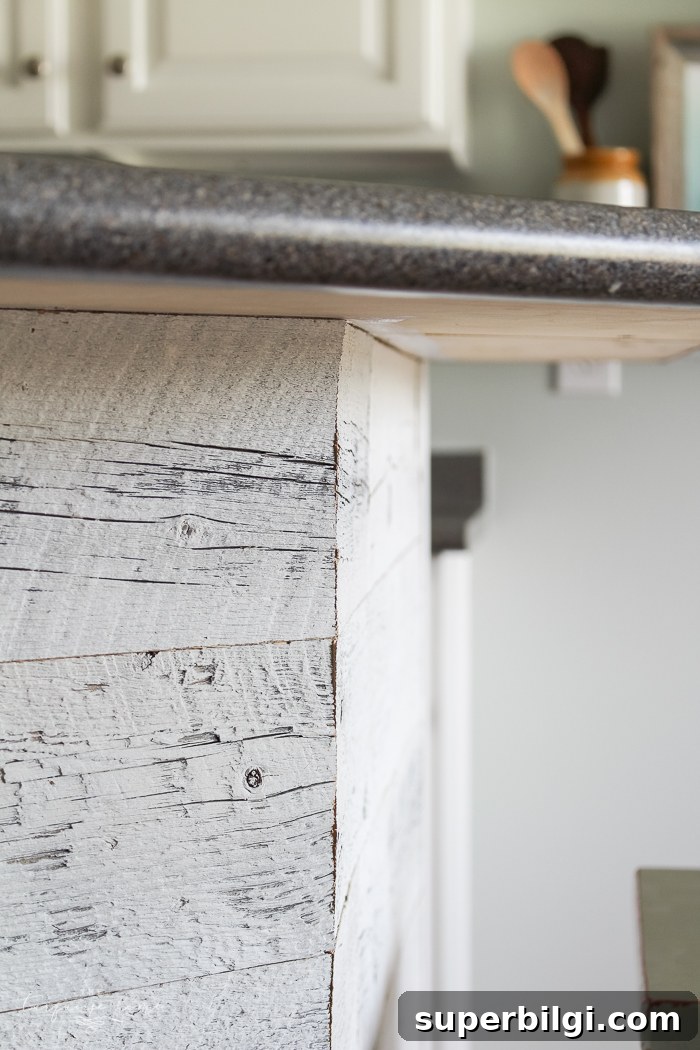 LOVE this beautiful transformation!! Weathered Reclaimed Kitchen Bar