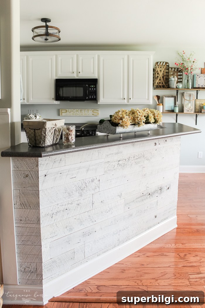 LOVE this beautiful transformation!! Weathered Reclaimed Kitchen Bar