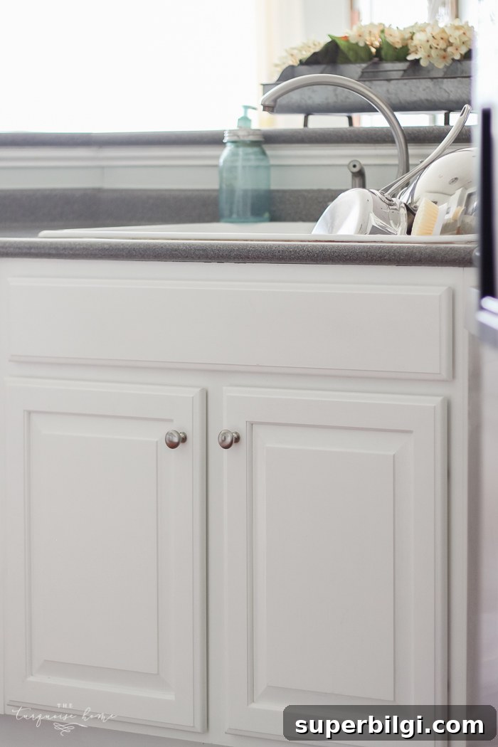 How to Measure and Install Cabinet Pulls for Perfect Alignment 8 Consider whether to add hardware to faux drawer below sink