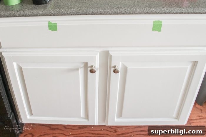 How to Measure and Install Cabinet Pulls for Perfect Alignment 4 Template aligned to drawer center with marks showing where to drill