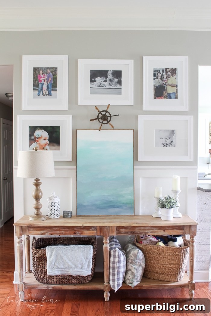 Create a Photo Gallery Wall: Layouts, Styling & Hanging Tips 8 Simple, large photos create a unified photo gallery wall in the living room!