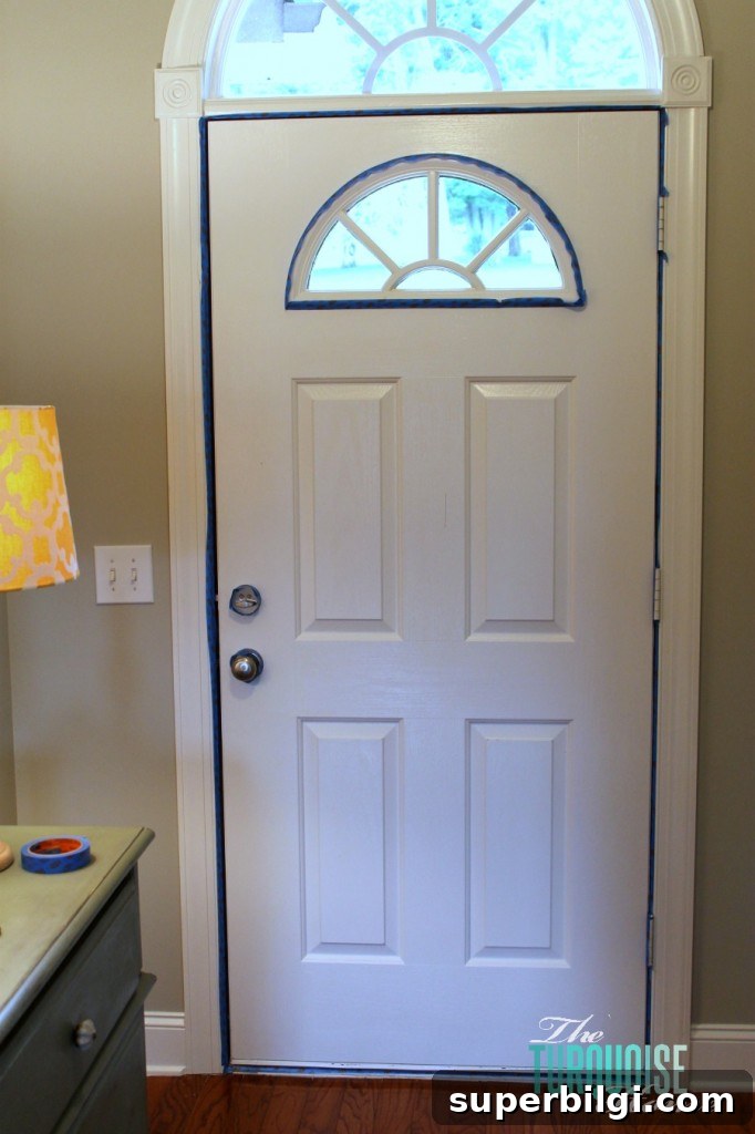 Paint an Interior Door in Hale Navy: Step-by-Step Guide 8 Taping off a painted front door