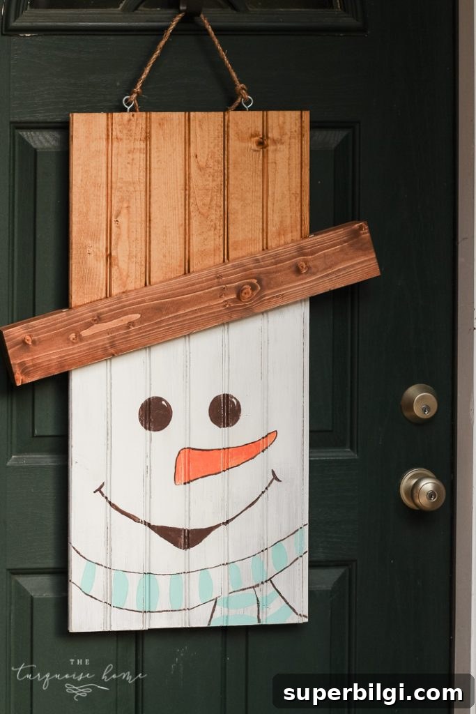 How to Make a Rustic Snowman Door Hanger for Winter 6 DIY Rustic Snowman Door Hanger #dihworkshop