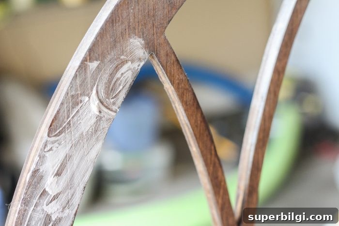 DIY Cathedral Window Frame for Your Fixer-Upper 6 Step 2: add a white paint and clear wax finish | LOVE this look for less! DIY Fixer Upper-style Cathedral Window Frame