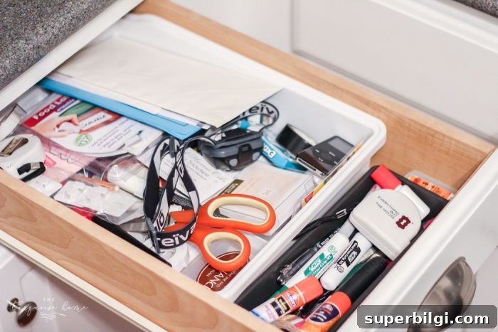Junk Drawer Makeover: Declutter and Organize in 15 Minutes 3 Junk drawer before organizing