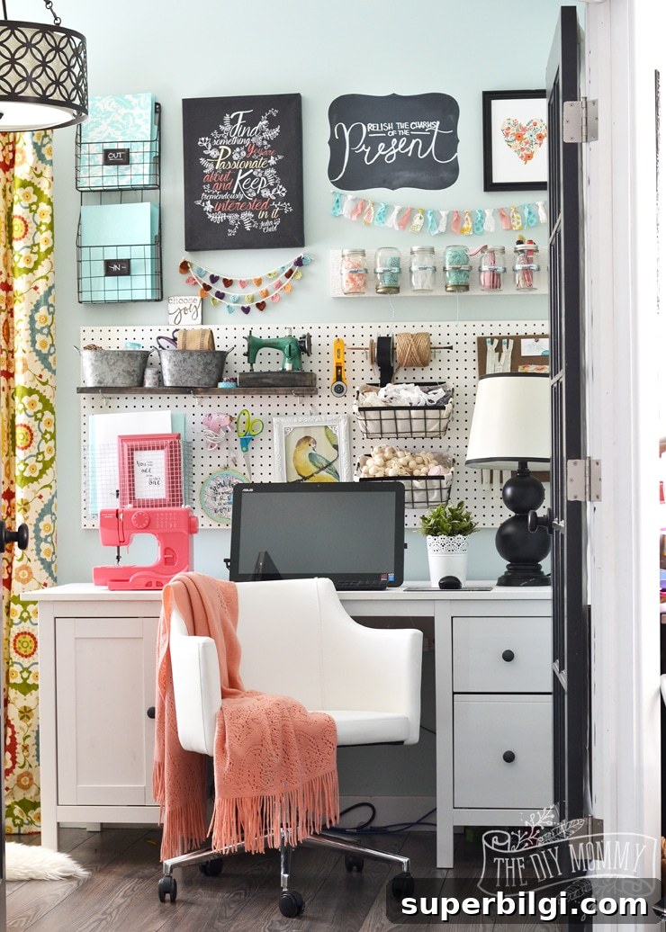 10 Colorful Craft Room Organization Ideas for Inspiring Spaces 2 Colorful Boho Craft Room Home Office from The DIY Mommy
