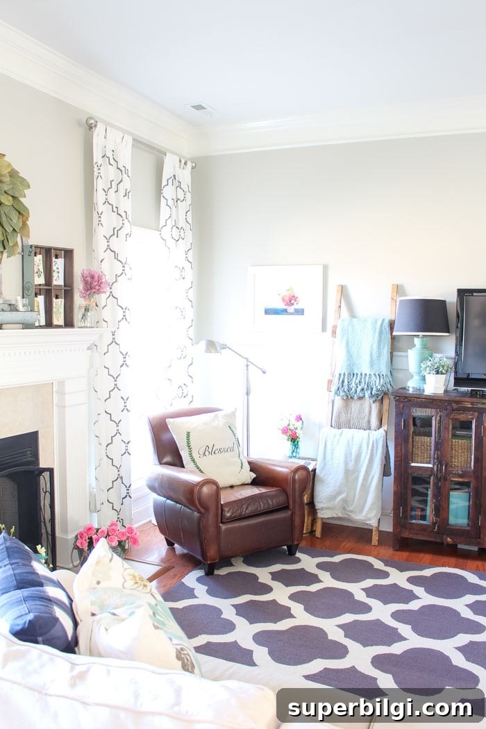 Isn't this just the prettiest pink and turquoise mantel?! Simple Floral Spring Mantel