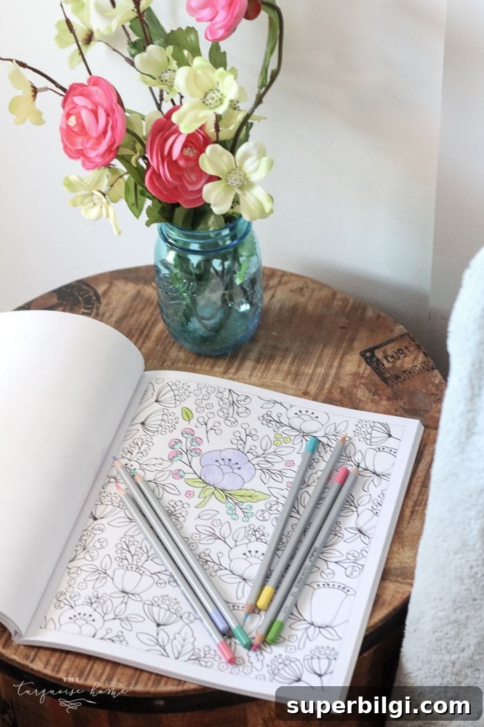 Isn't this just the prettiest pink and turquoise mantel?! Simple Floral Spring Mantel