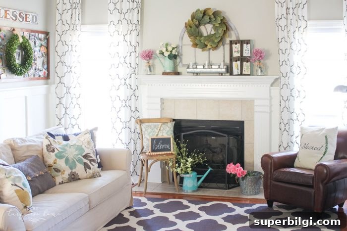 Isn't this just the prettiest pink and turquoise mantel?! Simple Floral Spring Mantel