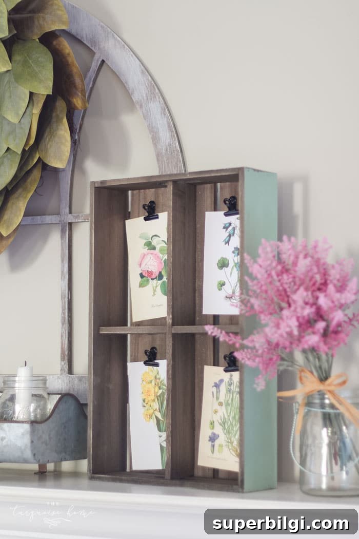 Isn't this just the prettiest pink and turquoise mantel?! Simple Floral Spring Mantel