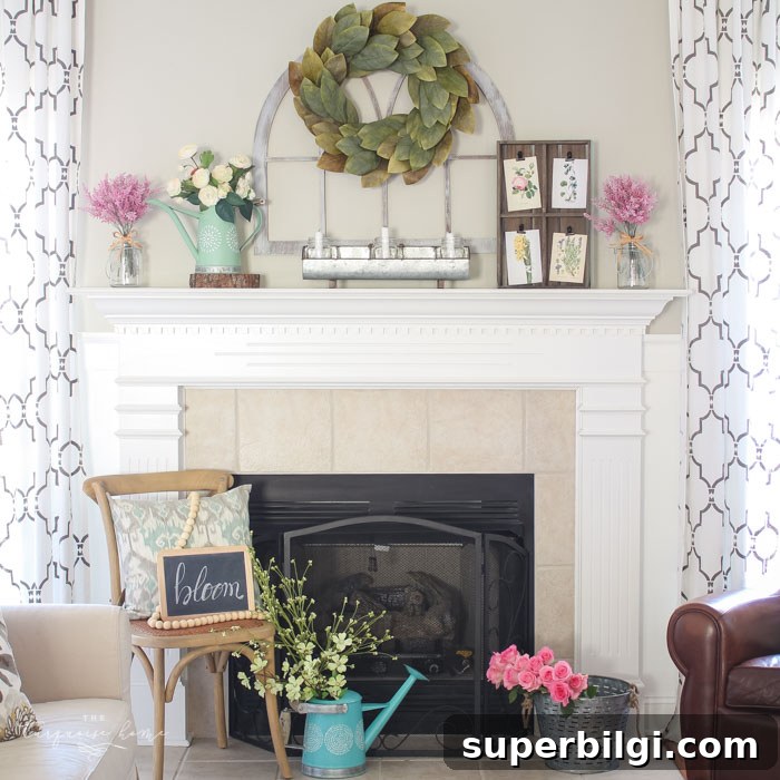 Isn't this just the prettiest pink and turquoise mantel?! Simple Floral Spring Mantel