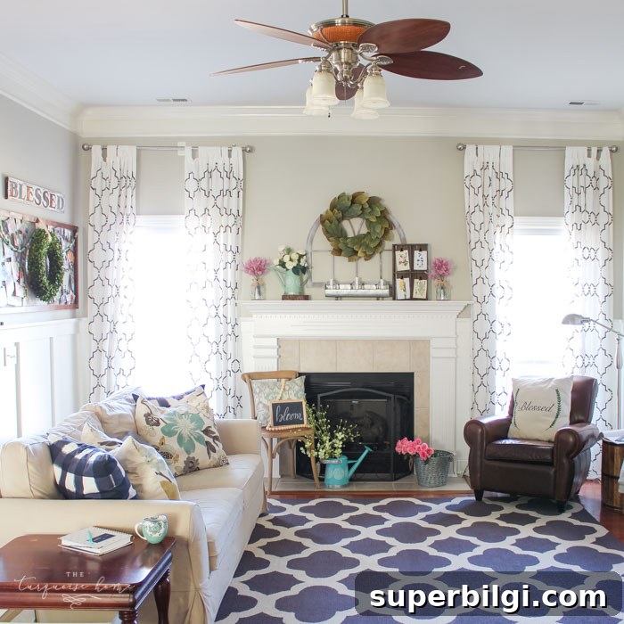 Isn't this just the prettiest pink and turquoise mantel?! Simple Floral Spring Mantel