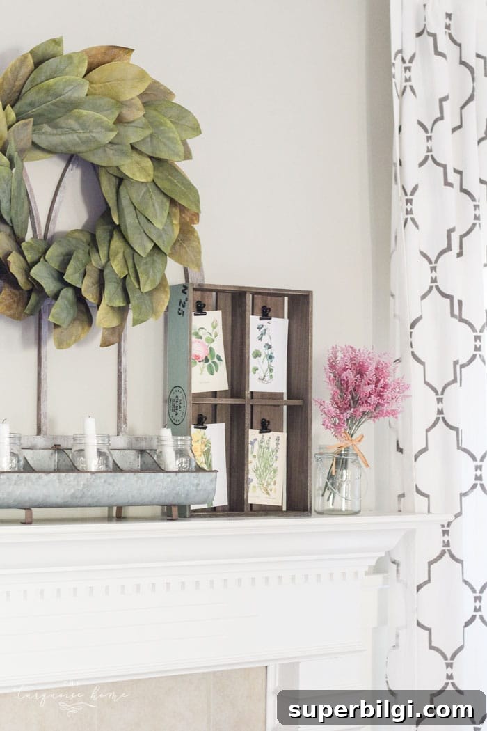 Isn't this just the prettiest pink and turquoise mantel?! Simple Floral Spring Mantel