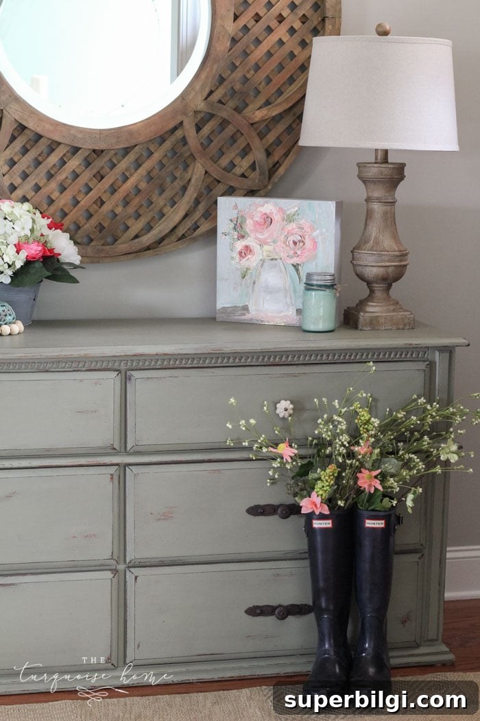 Spring Tablescape and Entryway Decor Ideas 6 Decorated entryway table with printable sign and wooden bead garland