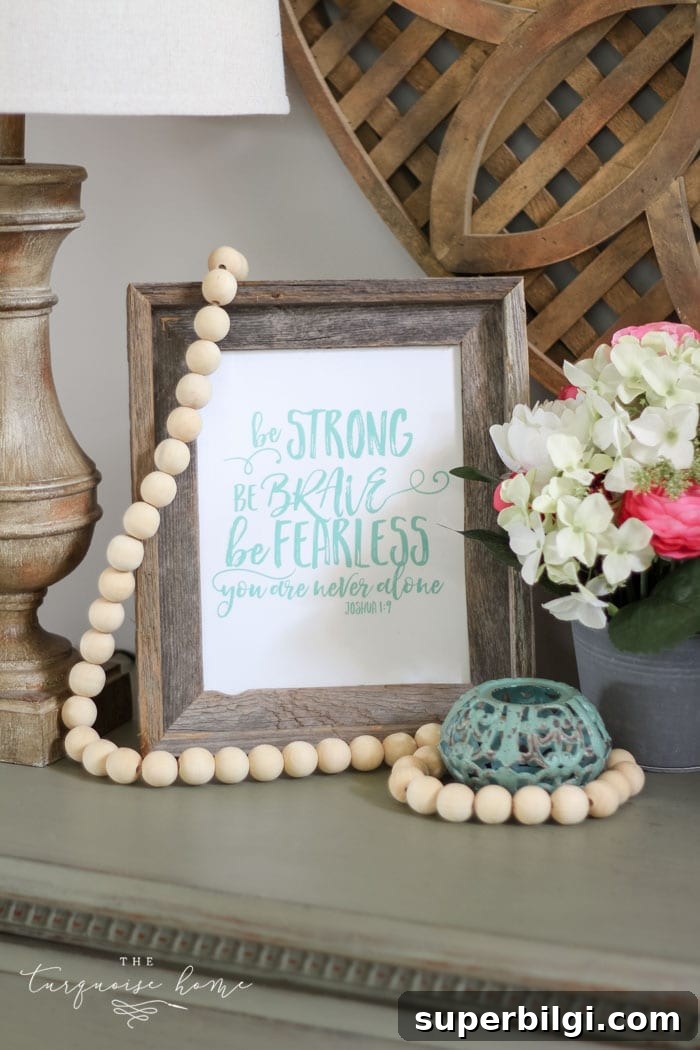 Spring Tablescape and Entryway Decor Ideas 7 Wooden bead garland and spring styling on an entryway table