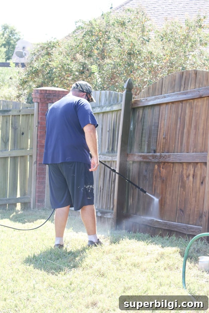 How to Paint a Wooden Fence Quickly: Step-by-Step Guide 3 This inexpensive paint sprayer is awesome!! How to Paint a Wood Fence the Easiest and Fastest Way! Take a minute to CLICK the link and access hundreds of other tutorials, tips and ideas for DIY home projects. This site is a MUST for any DIYer.