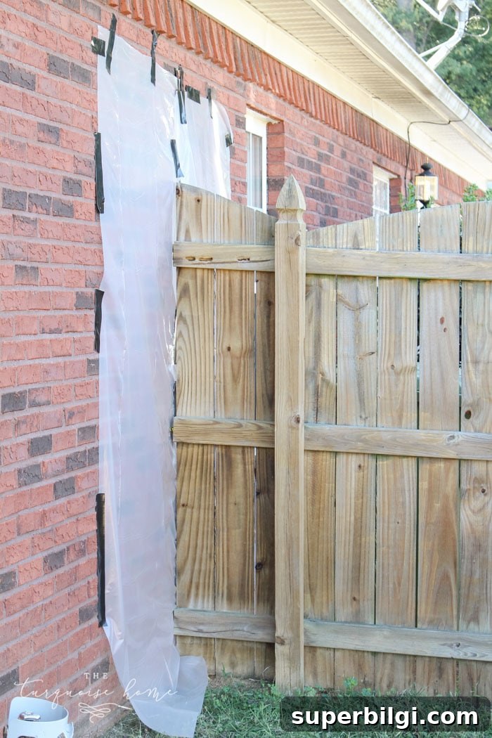 How to Paint a Wooden Fence Quickly: Step-by-Step Guide 5 This inexpensive paint sprayer is awesome!! How to Paint a Wood Fence the Easiest and Fastest Way! Take a minute to CLICK the link and access hundreds of other tutorials, tips and ideas for DIY home projects. This site is a MUST for any DIYer.